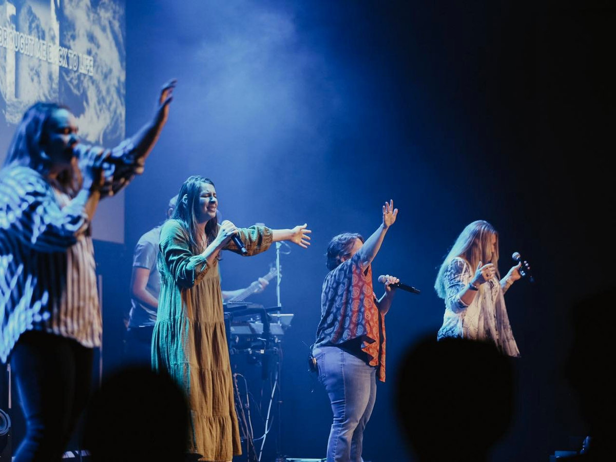 Worshipping together at World Harvest Church